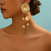 Leopard Print Disc Long Tassel Earrings | Close-up View | Leopard Print Disc & Tassel Detail